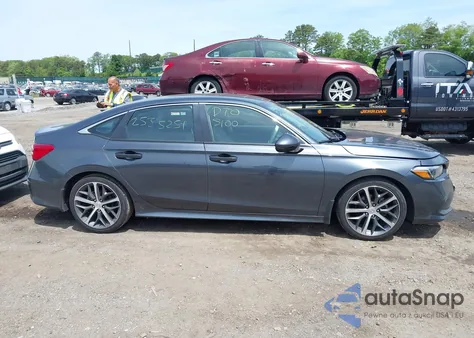 2023 Honda Civic Touring z USA, uszkodzony, nr VIN 2HGFE1F99PH321050